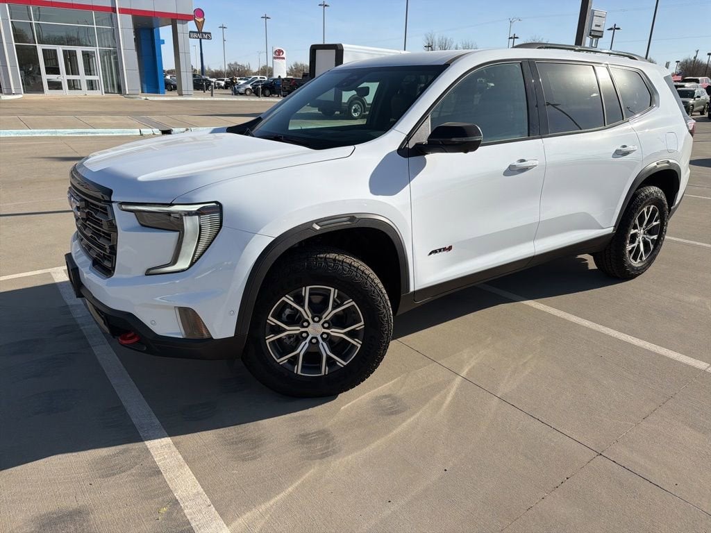 2026 GMC Acadia AT4 in Summit White — front three-quarter view