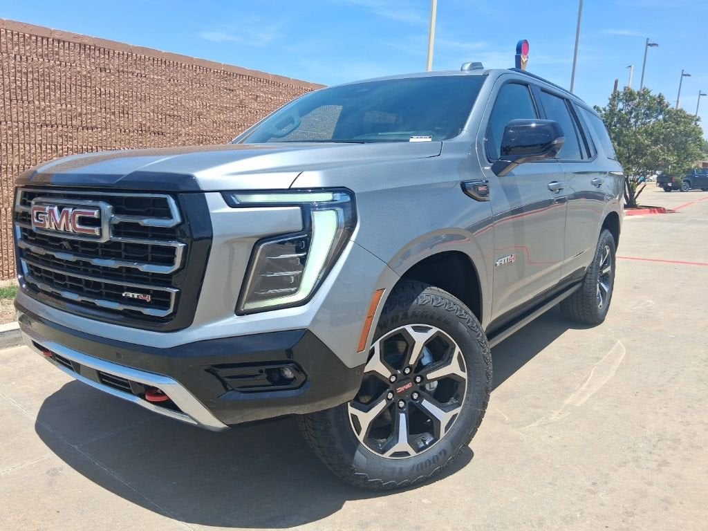 2026 GMC Yukon AT4 in Sterling Metallic — front three-quarter view