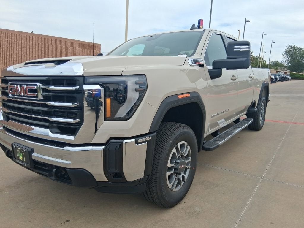 2026 GMC Sierra 2500 HD SLE in Coastal Dune — front three-quarter view