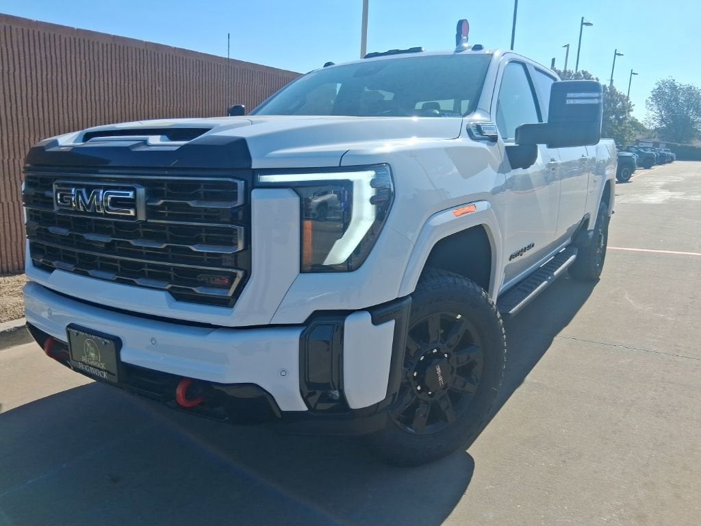 2026 GMC Sierra 2500 HD AT4 in Summit White — front three-quarter view