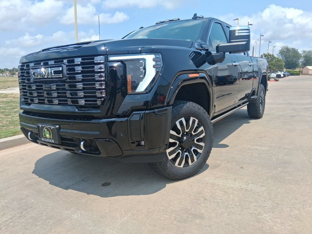 2026 GMC Sierra 2500 HD Denali Ultimate in Onyx Black — front three-quarter view