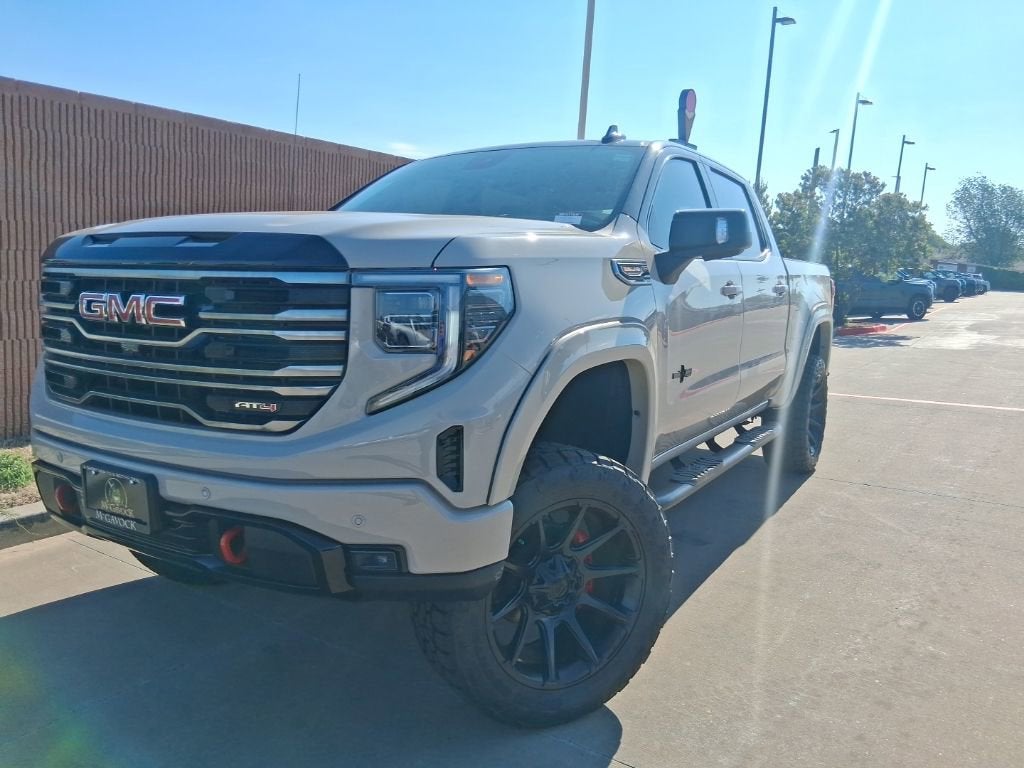 2026 GMC Sierra 1500 AT4 in Coastal Dune — front three-quarter view